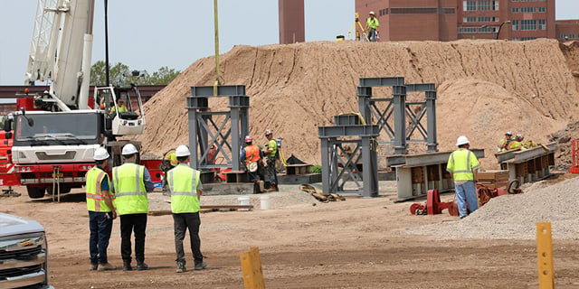 People working in the field post-covid